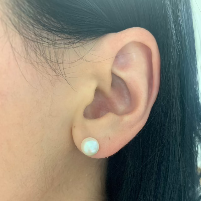 Johanna Brierley freshwater pearl stud earrings with 7mm pink-toned pearls and sterling silver