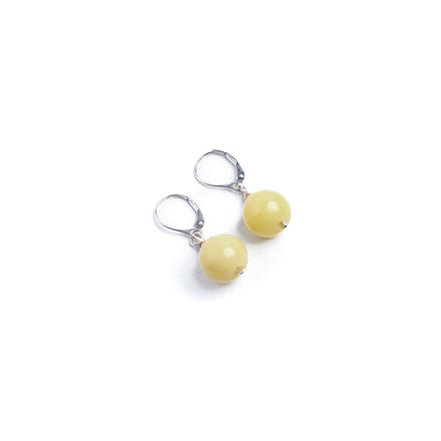 Sterling silver olive jade earrings with 18k gold beads and french hook leverbacks. Shop online.