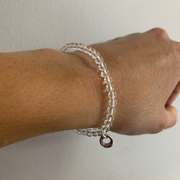 Johanna Brierley Clear Quartz Stretchie Baby Bracelet with rock crystal gemstones and Lucky Stone charm