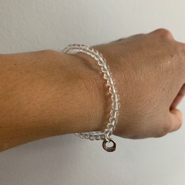 Johanna Brierley Clear Quartz Stretchie Baby Bracelet with rock crystal gemstones and Lucky Stone charm